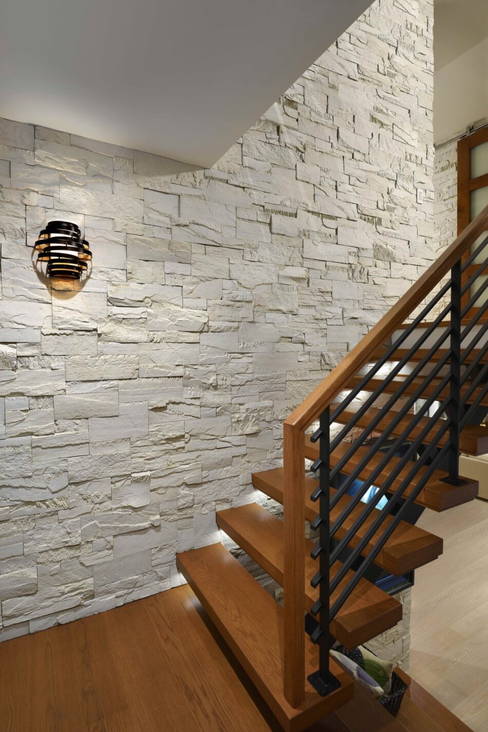 Stone Wall and Interior Steel Staircase